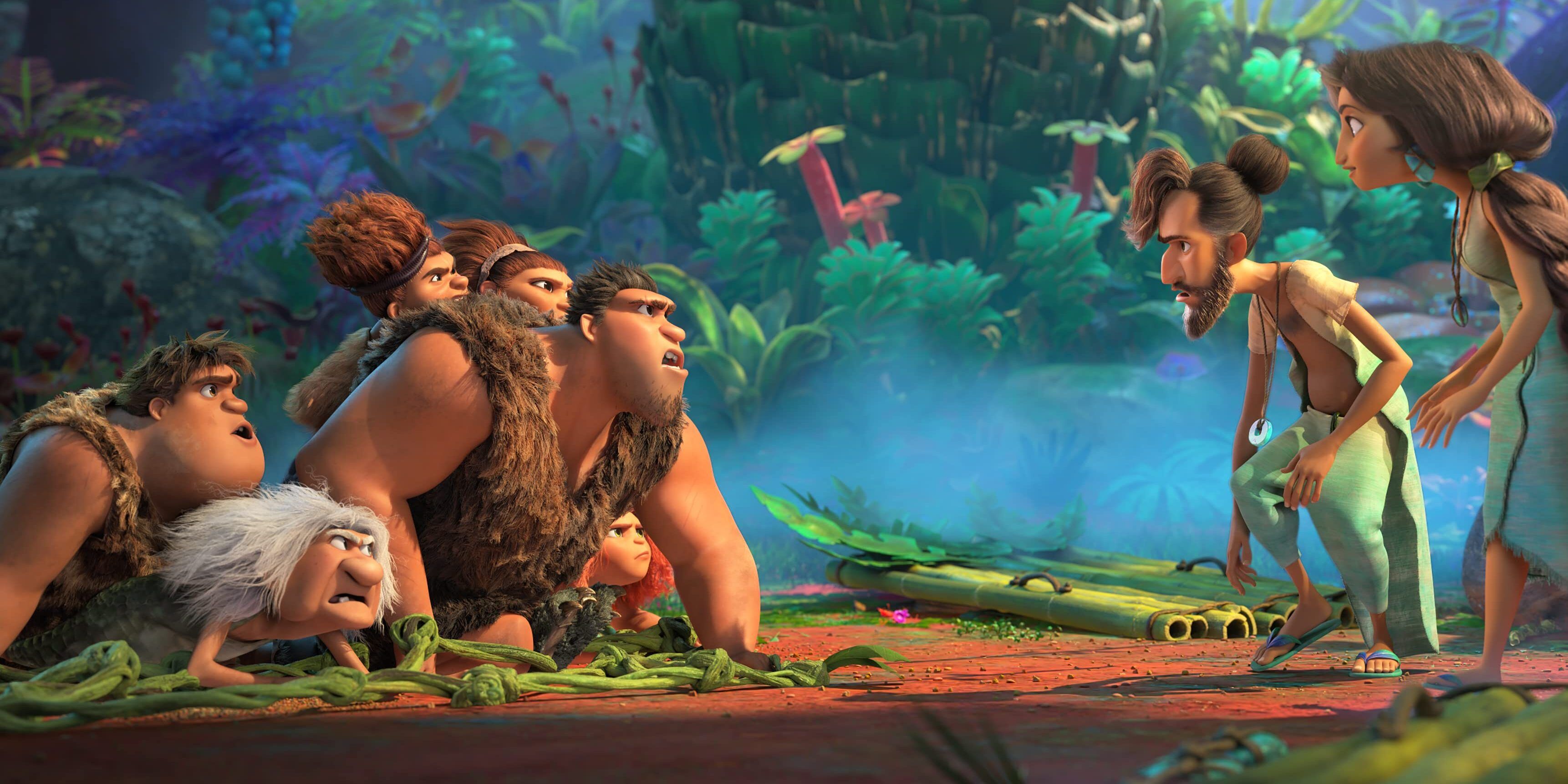 A still from the movie The Croods: A New Age where the Croods family is looking with curiosity towards the Betterman family