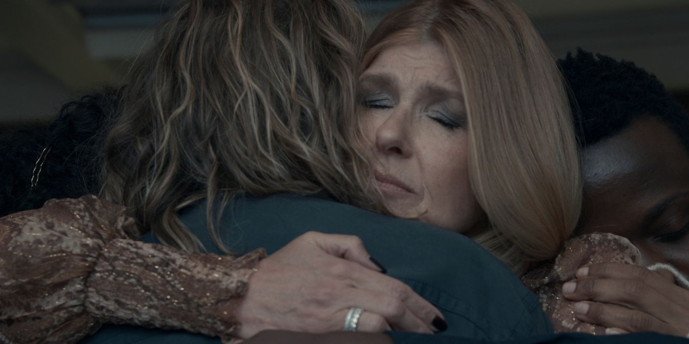 Connie Britton as Dee Dee hugging her support group in Dear Edward