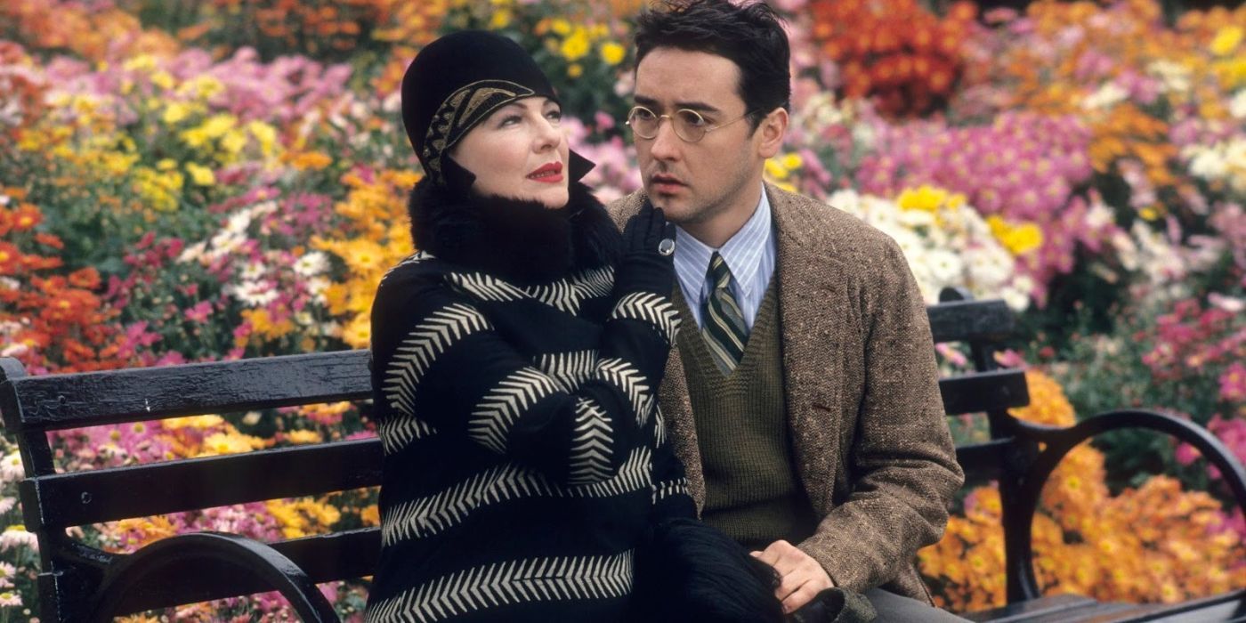 Dianne Wiest and John Cusack on a park bench in Bullets Over Broadway