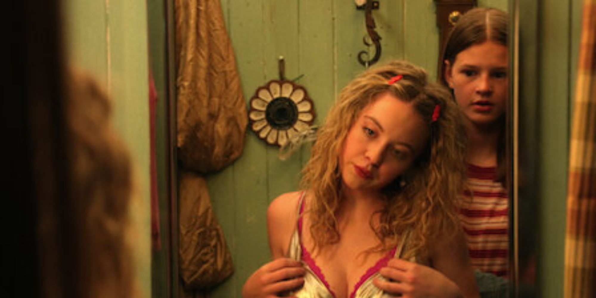 Sydney Sweeney looking at a mirror in Everything Sucks