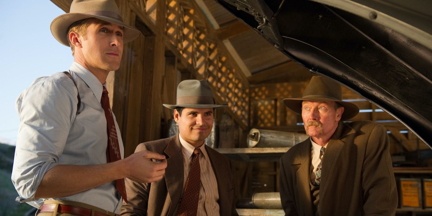 Ryan Gosling as Jerry Wooters, Michael Peña as Officer Navidad Ramirez, and Robert Patrick as Officer Max Kennard in Gangster Squad