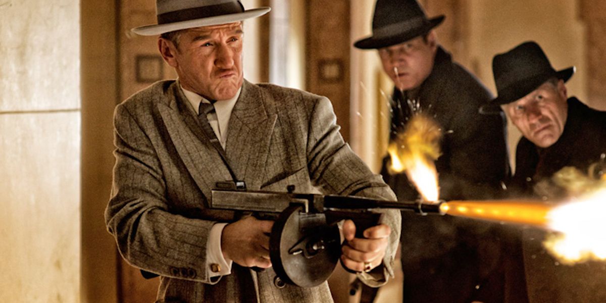 Sean Penn as Mickey Cohen firing a gun in Gangster Squad