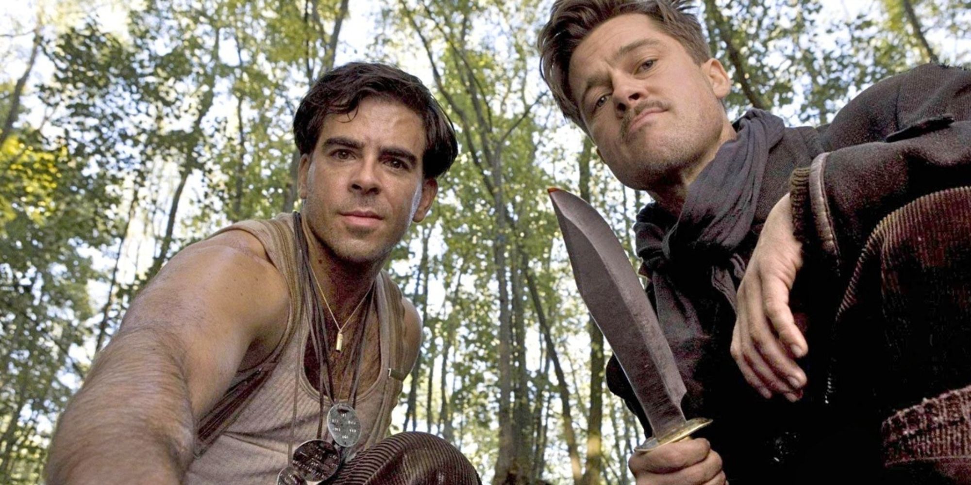 Aldo Raine holding up a dagger next to Donnie Donowitz in Inglorious Basterds