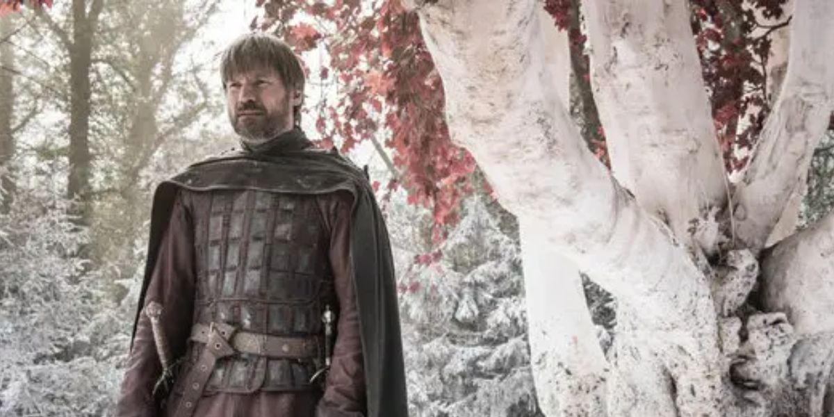 Nikolaj Coster-Waldau en Jaime Lannister devant l'arbre Weirwood dans Game of Thrones.
