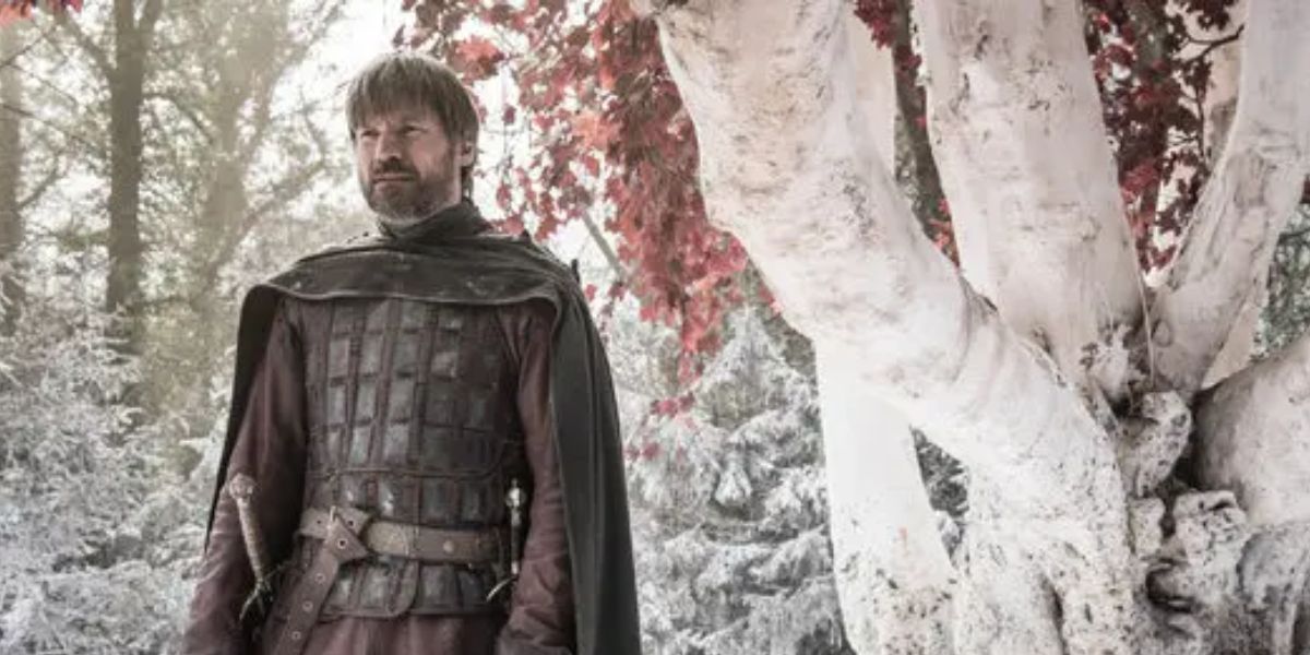 Nikolaj Coster-Waldau as Jaime Lannister in front of the Weirwood tree in Game of Thrones