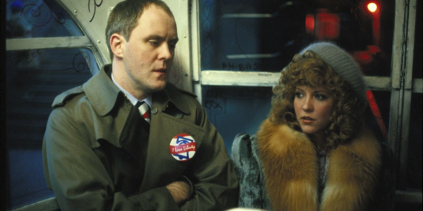 John Lithgow and Nancy Allen as Burke and Sally nex to each other in the film Blow Out