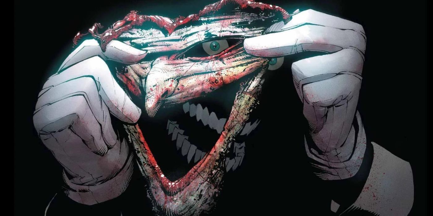 The Joker holding up his mask made out of his own skin in 2011 Batman comics