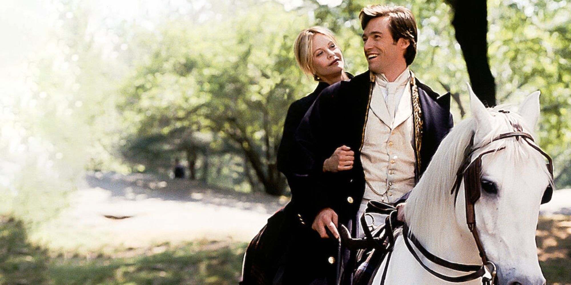 Meg Ryan and Hugh Jackman riding a horse in 'Kete & Leopold'