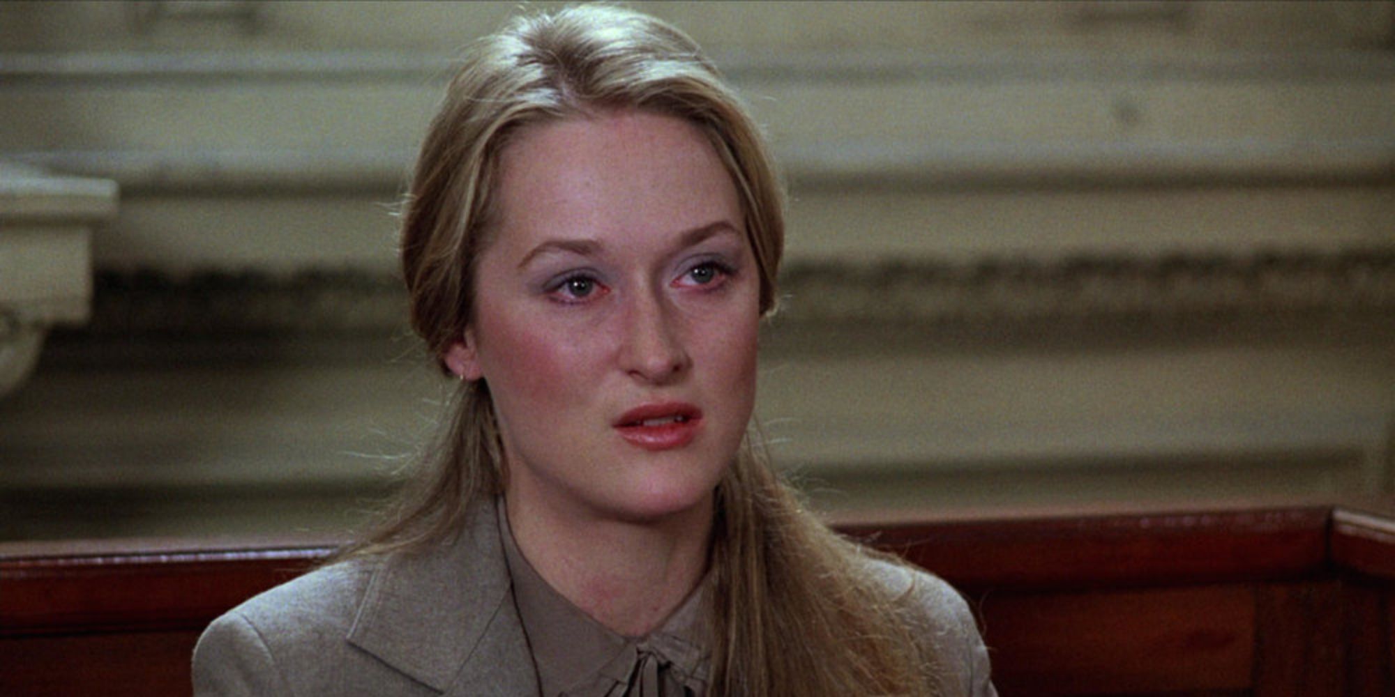 Meryl Streep as Joanna Kramer looking intently while testifying at court in Kramer vs. Kramer.
