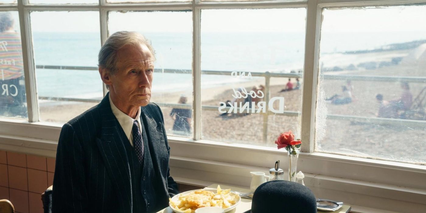 Bill Nighy sitting in a diner in Living