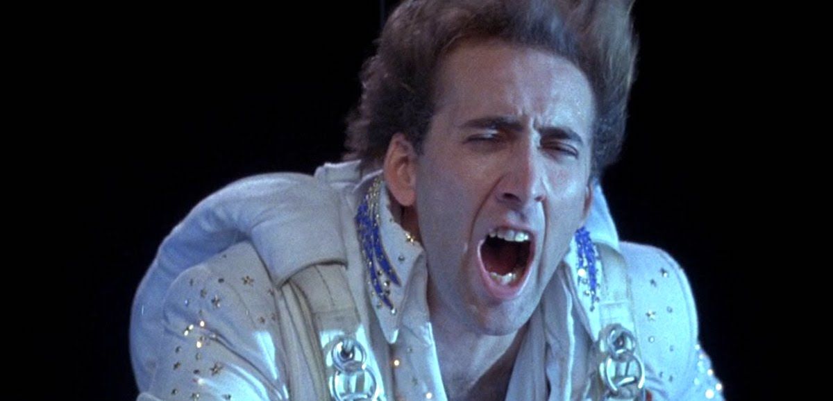 Nicolas Cage skydiving as an Elvis impersonator in Honeymoon in Vegas (1992)