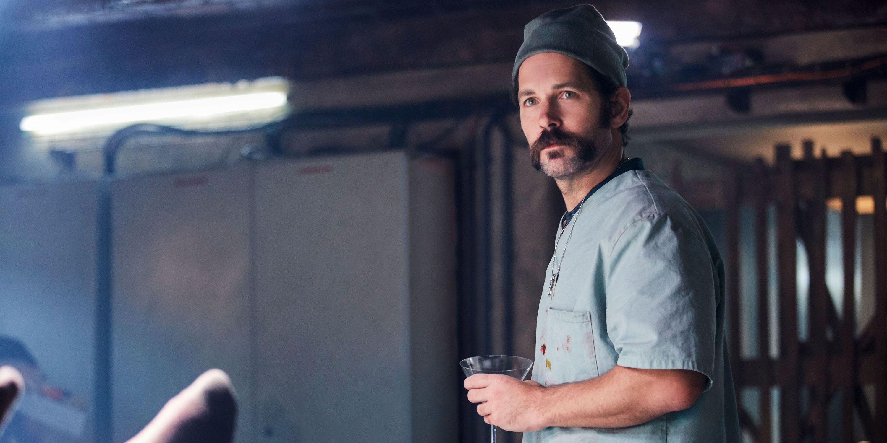 Cactus Bil holding a cocktail in the 2018 film Mute