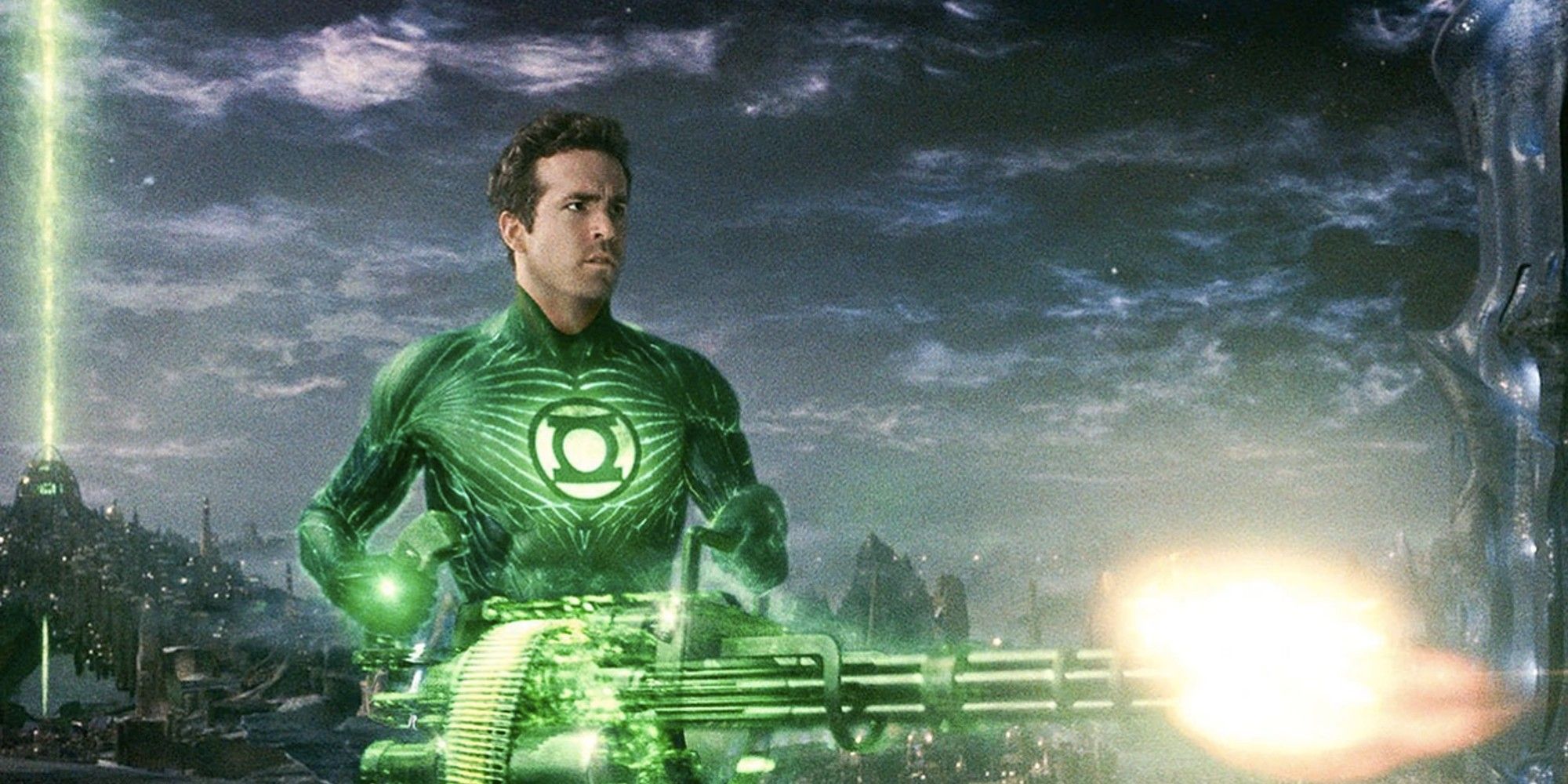 Ryan Reynolds as Hal Jordan wielding a gatling gun in 'Green Lantern.'