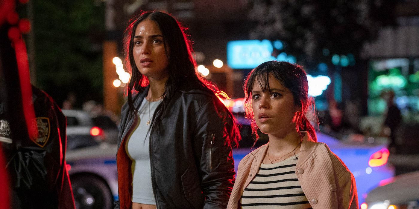 Melissa Barrera as Sam and Jenna Ortega as Tara standing together on the street in Scream 6