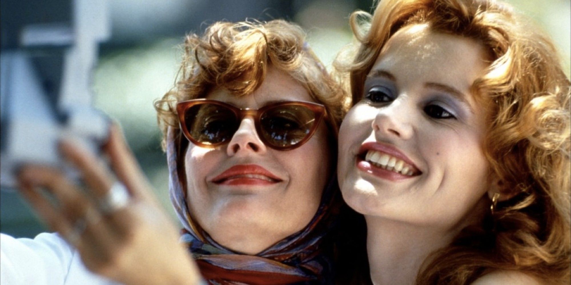 Thelma and Louise taking a selfie together in 'Thelma and Louise'