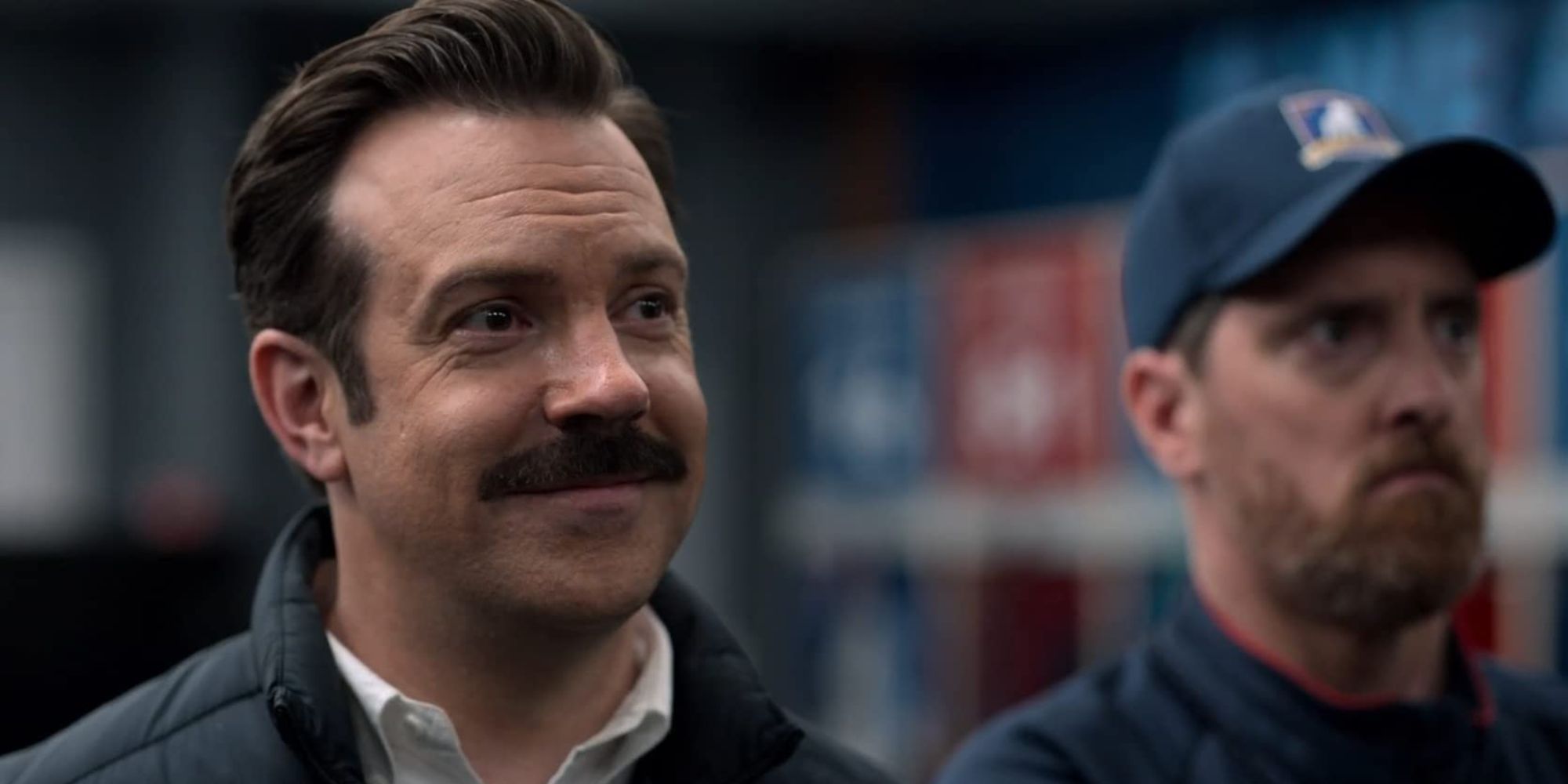 Jason Sudeikis smiling in Ted Lasso