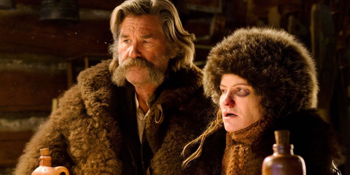 John "The Hangman" Ruth and "Crazy" Daisy Domergue looking in the same direction in The Hateful Eight