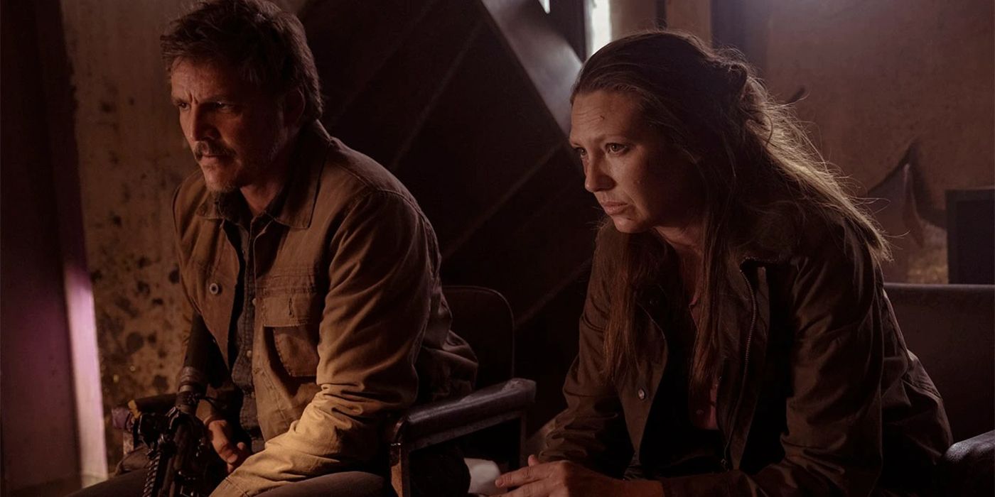 Pedro Pascal as Joel and Anna Torv as Tess sitting side by side in The Last of Us.