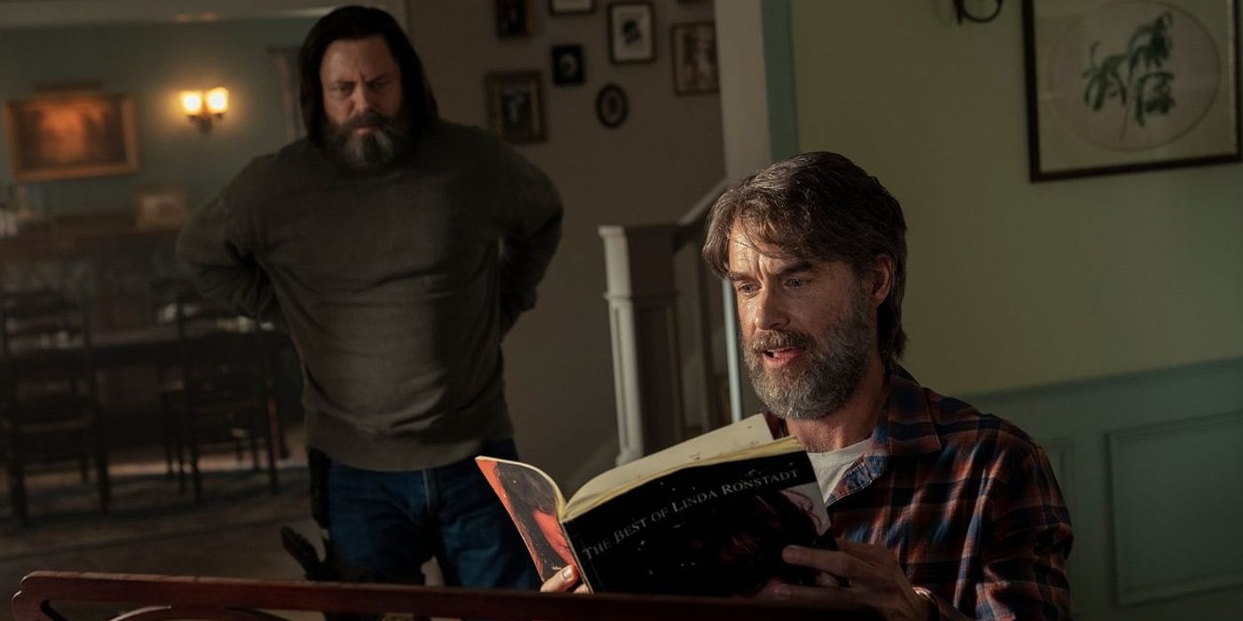 Murray Bartlett as Frank playing the piano while Nick Offerman as Bill watches in The Last of Us Episode 3