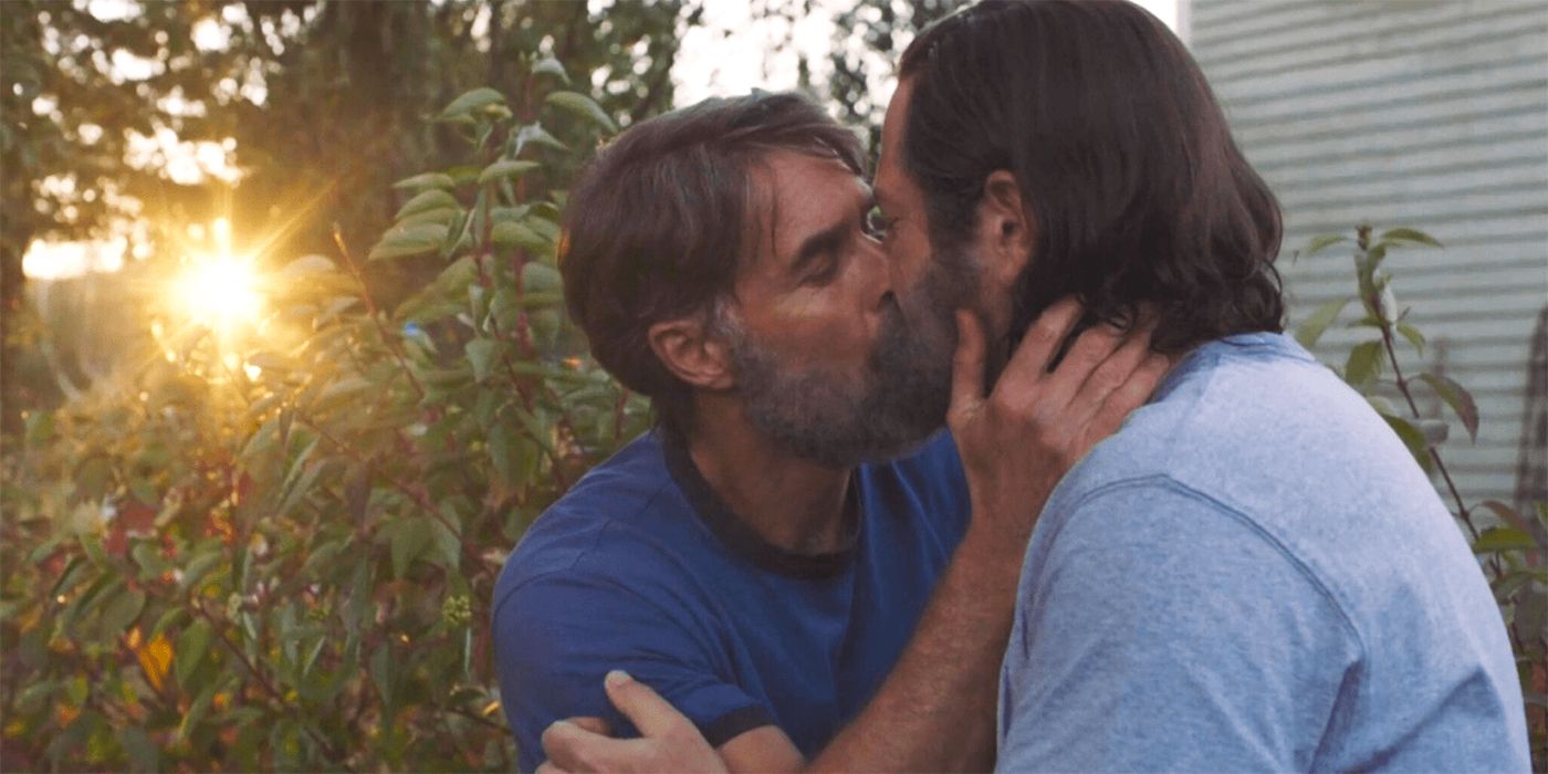 Nick Offerman as Bill and Murray Bartlett as Frank kissing in the garden in HBO's The Last of Us