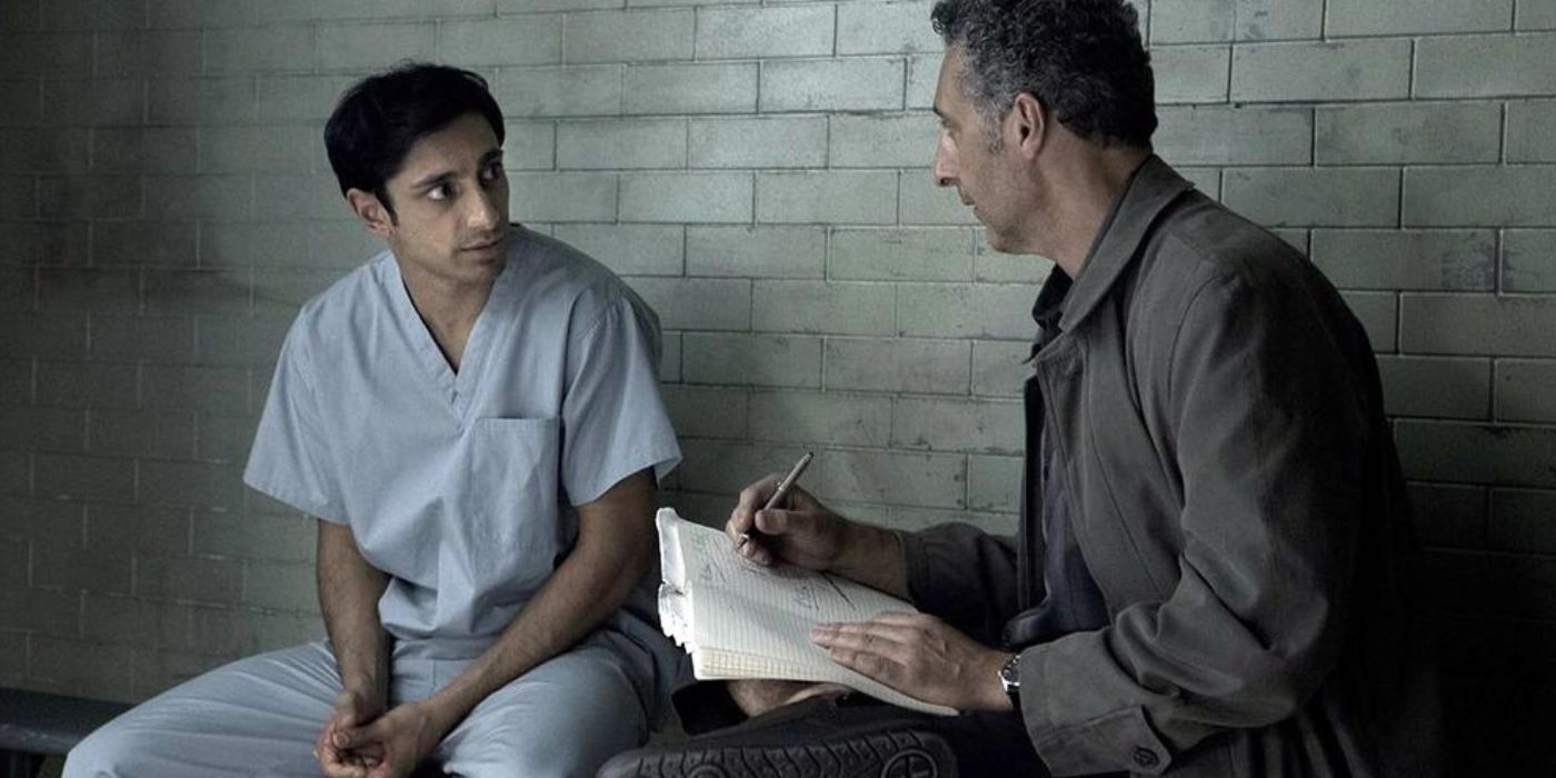 Riz Ahmed and John Turturro talking in a cell in The Night Of