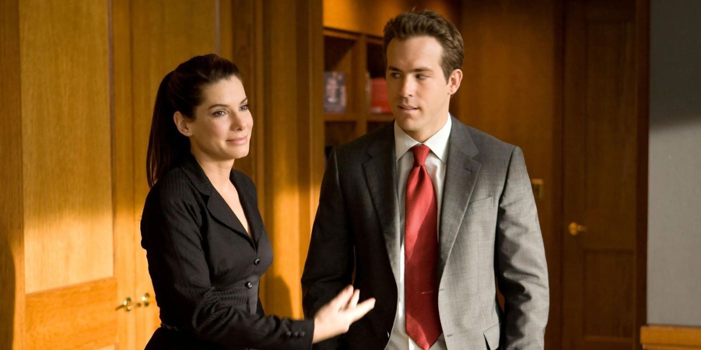 Sandra Bullock and Ryan Reynolds in the office in The Proposal 