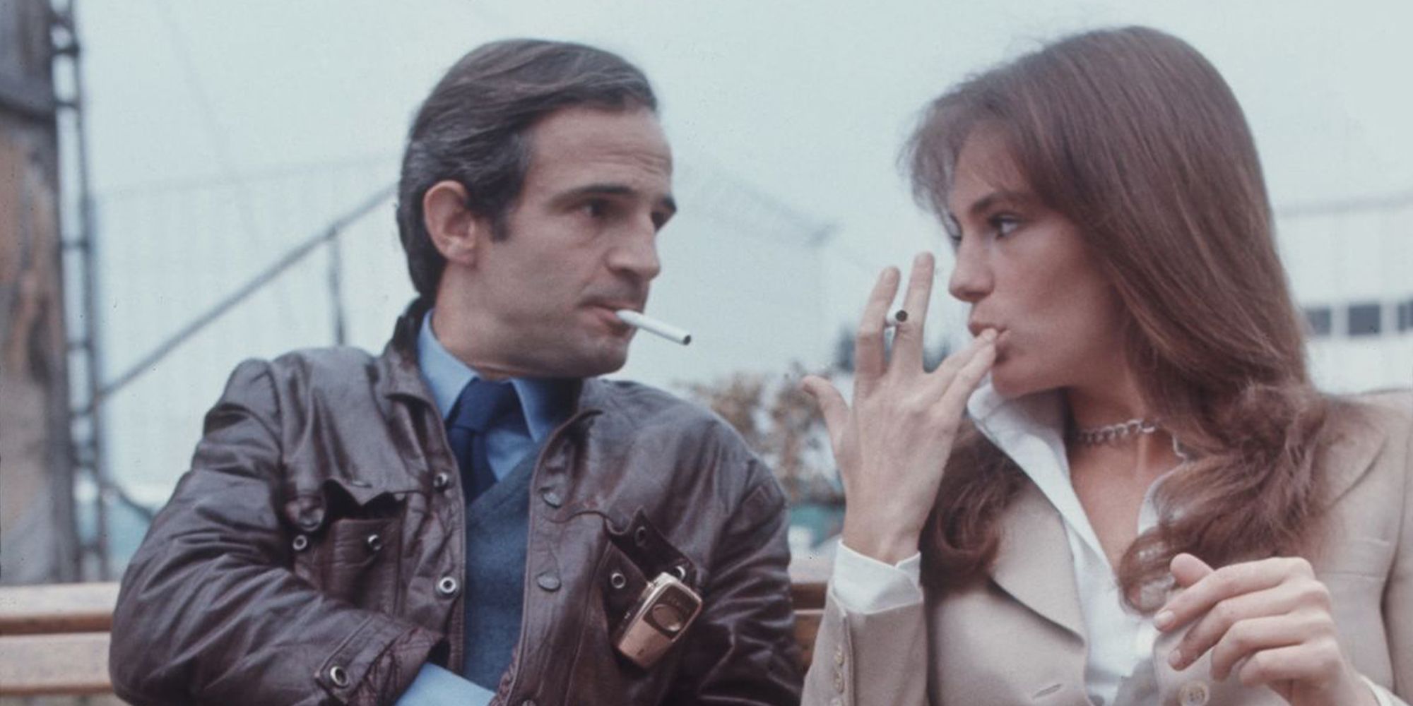 Truffaut smokes a cigarette alongside Jacqueline Bisset in a screengrab from Truffaut's Day for Night