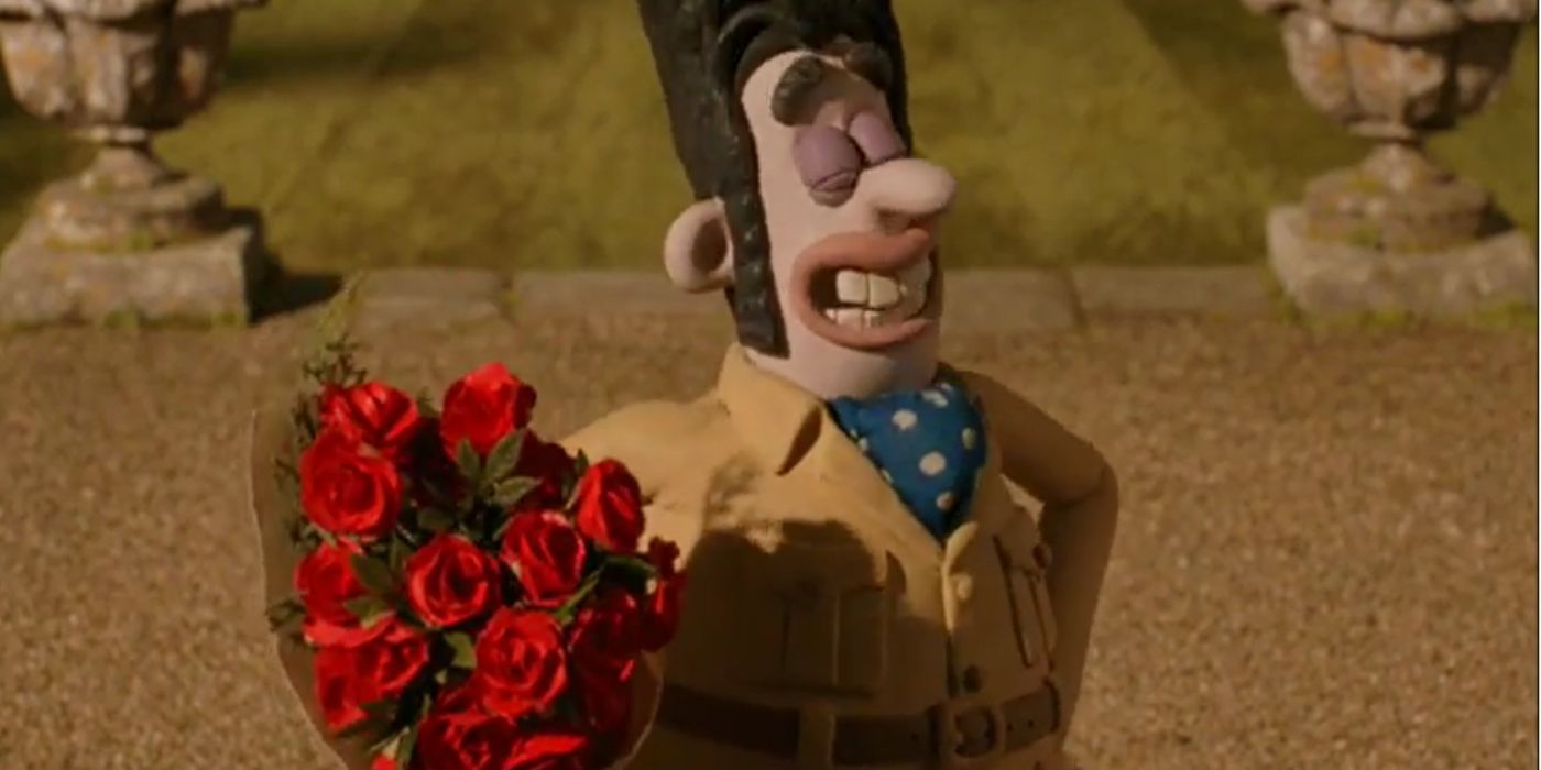 Victor Quartermaine sourit en tenant un bouquet de roses dans Wallace & Gromit : La malédiction du lapin-garou.
