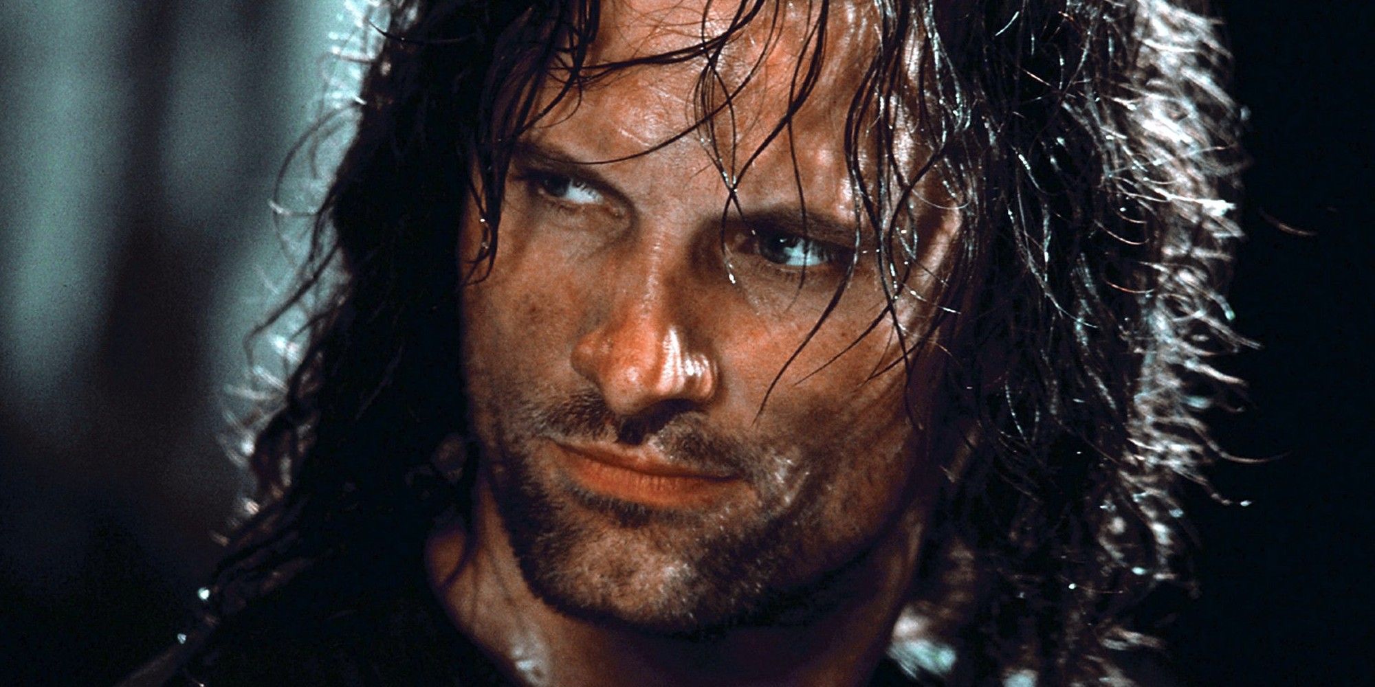 A close up of Viggo Mortensen in The Lord of the Rings: The Fellowship of the Ring