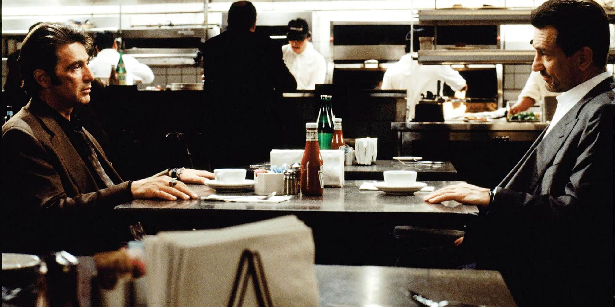 Al Pacino and Robert De Niro in the restaurant scene from Heat