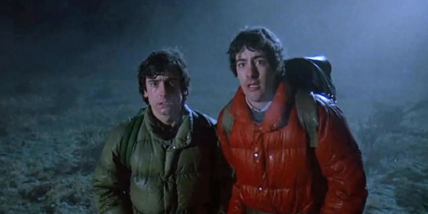 David Naughton as David Kessler and Griffin Dunne as Jack Goodman standing next to each other in the dark during their walking tour in 'An American Werewolf in London'