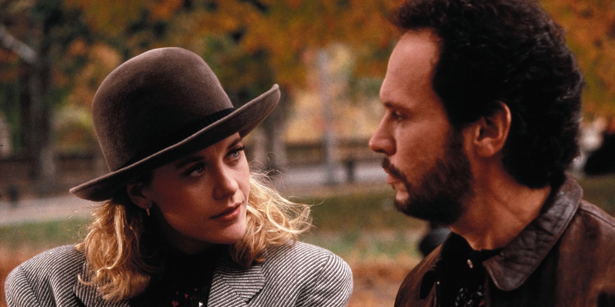 Meg Ryan and Billy Crystal looking at each other in When Harry Met Sally...