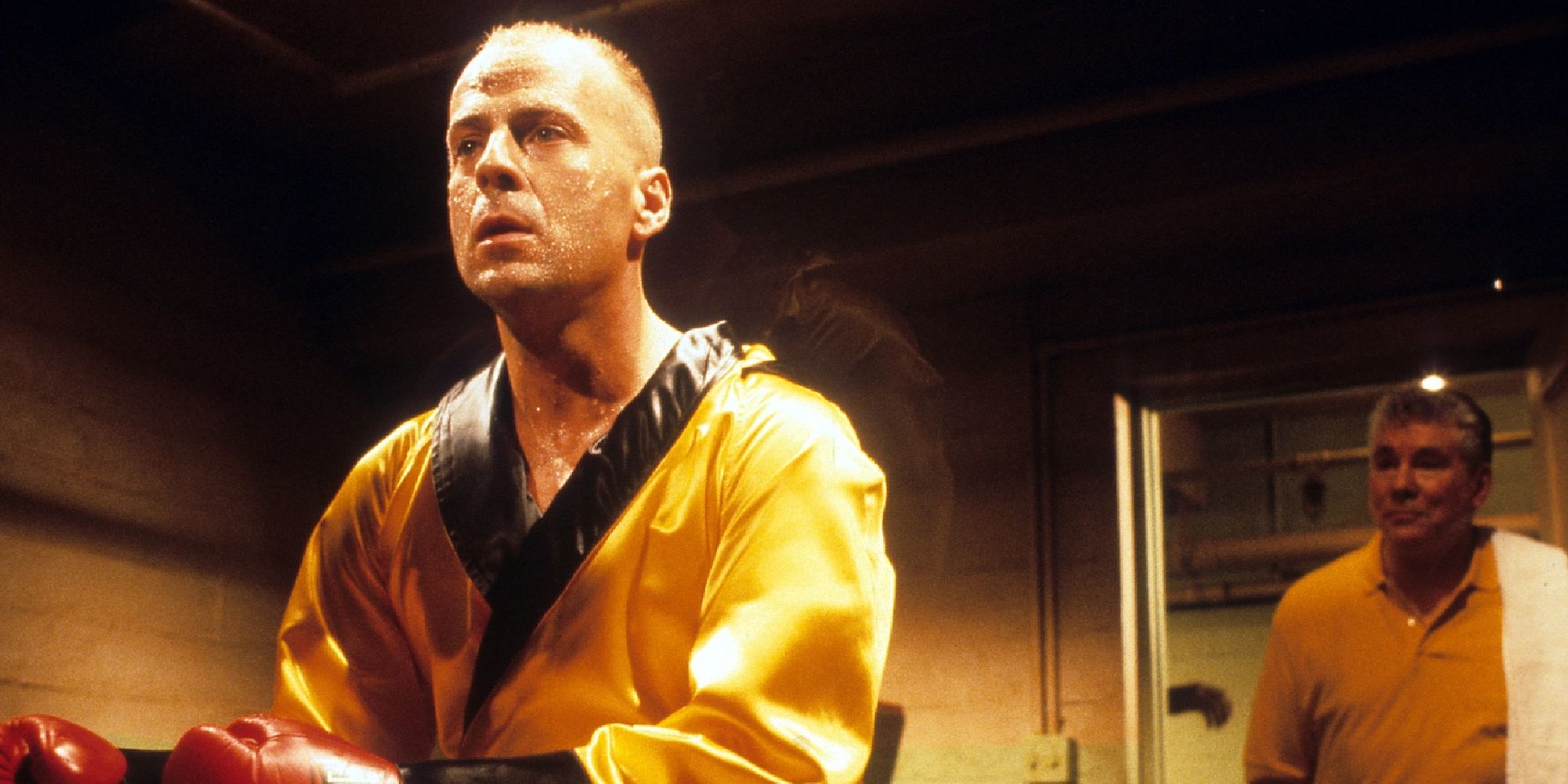 Bruce Willis as Butch Coolidge with his ring robe on