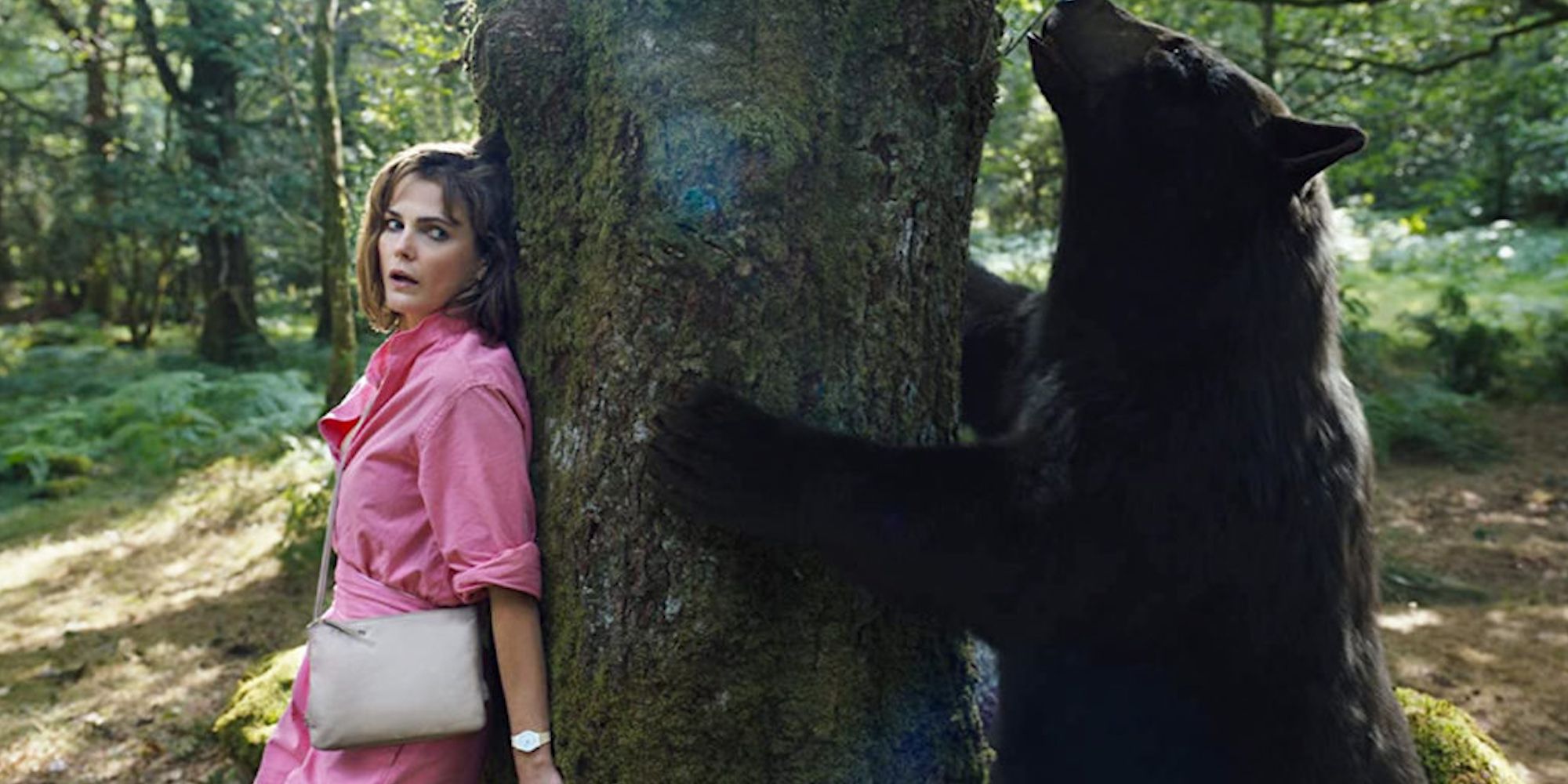 Keri Russell hiding from the bear in Cocaine Bear
