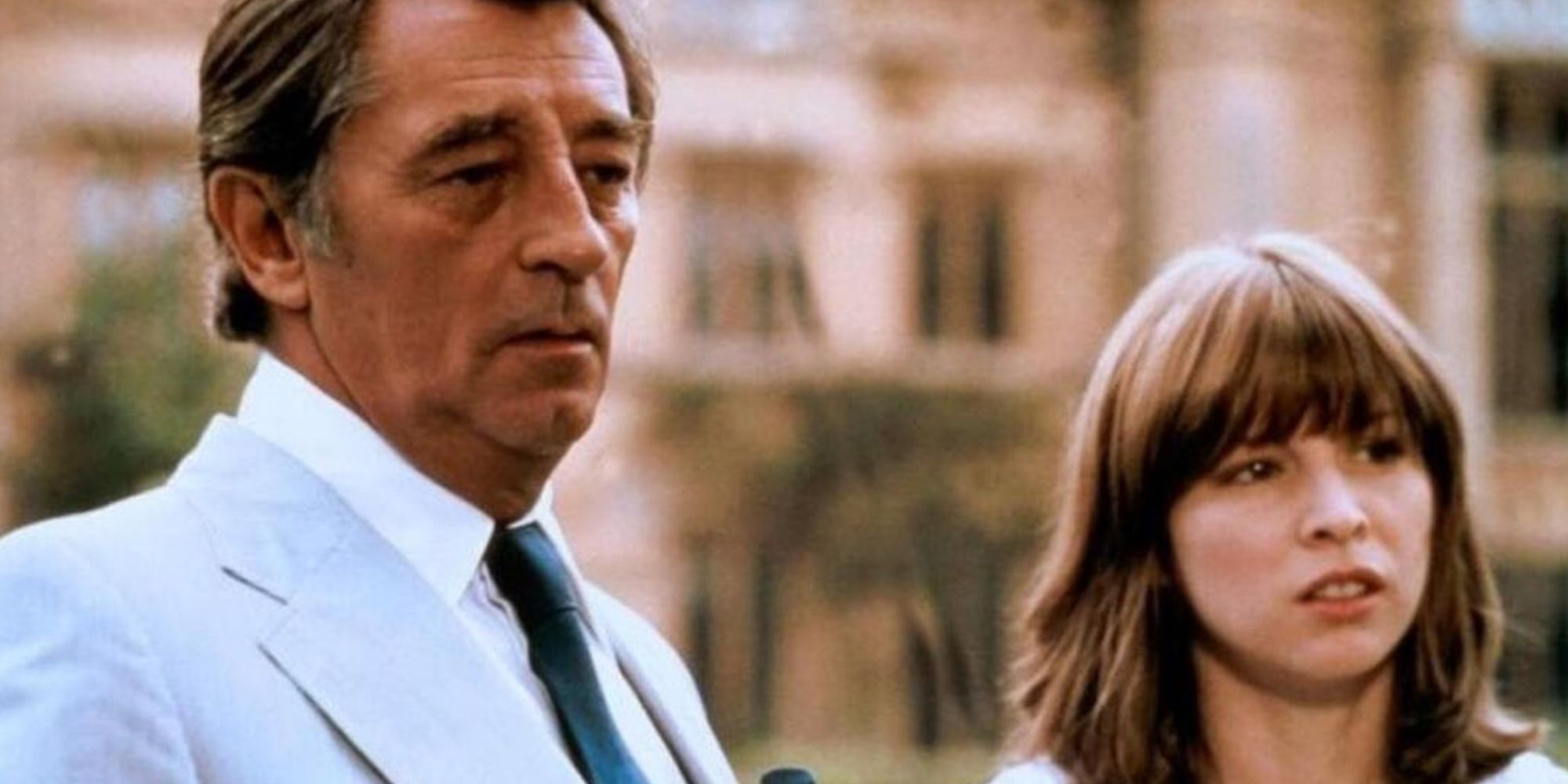 Philip Marlowe and Camila Sternwood looking to their side in 1978's The Big Sleep