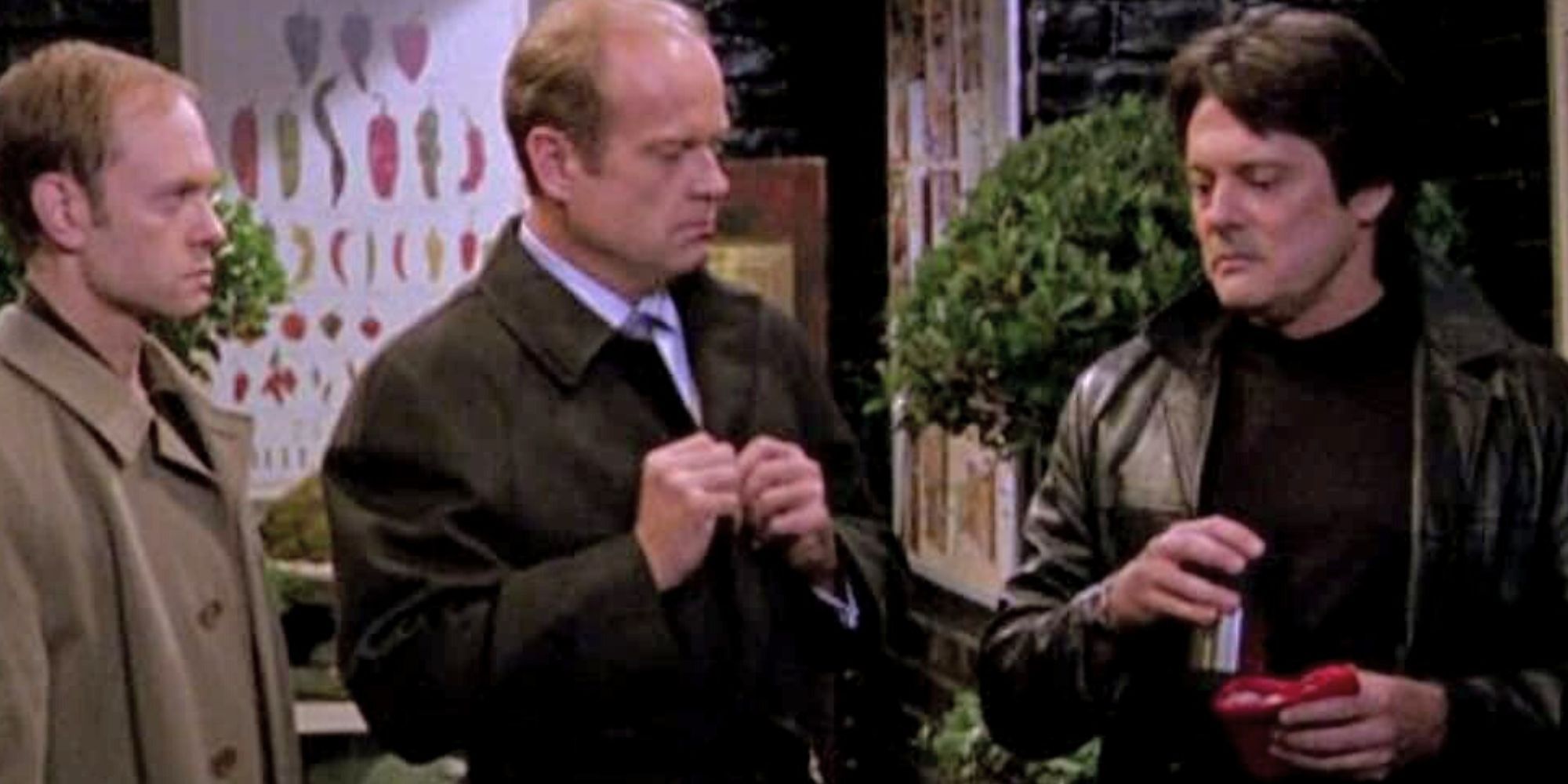 David Hyde Pierce standing next to Kelsey Grammer and a man in Frasier
