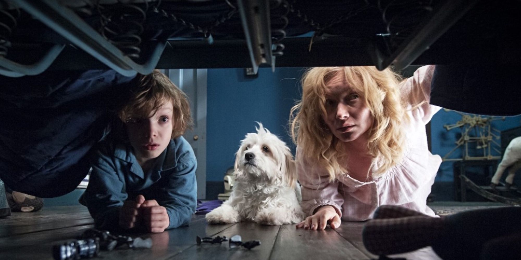 Essie Davis and Noah Wiseman looking under the bed in 'The Babadook'