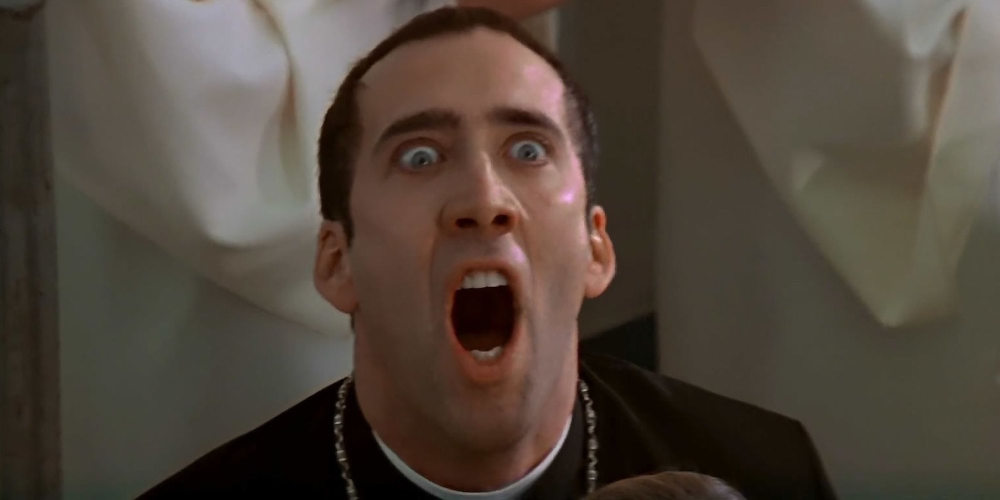 Nicolas Cage  as Castor Troy screaming in rage in Face Off