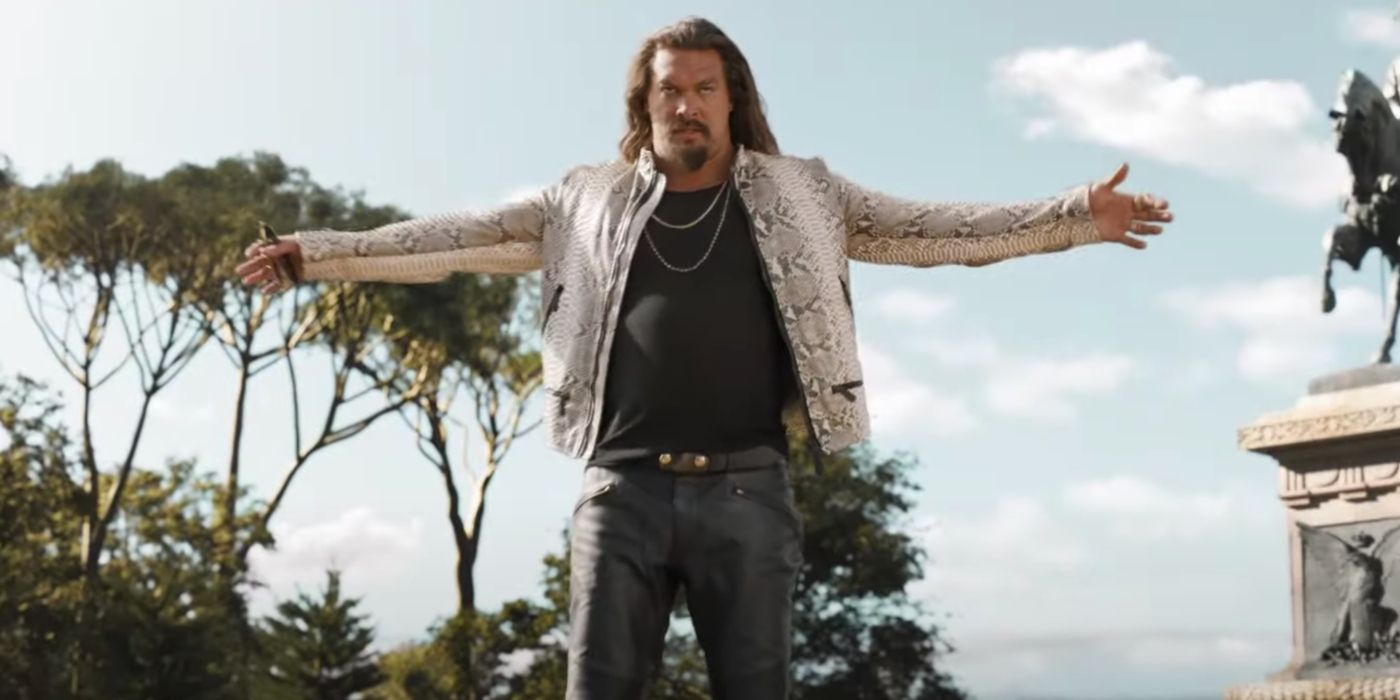 Jason Momoa as Dante stands with his arms outstretched in Fast X.