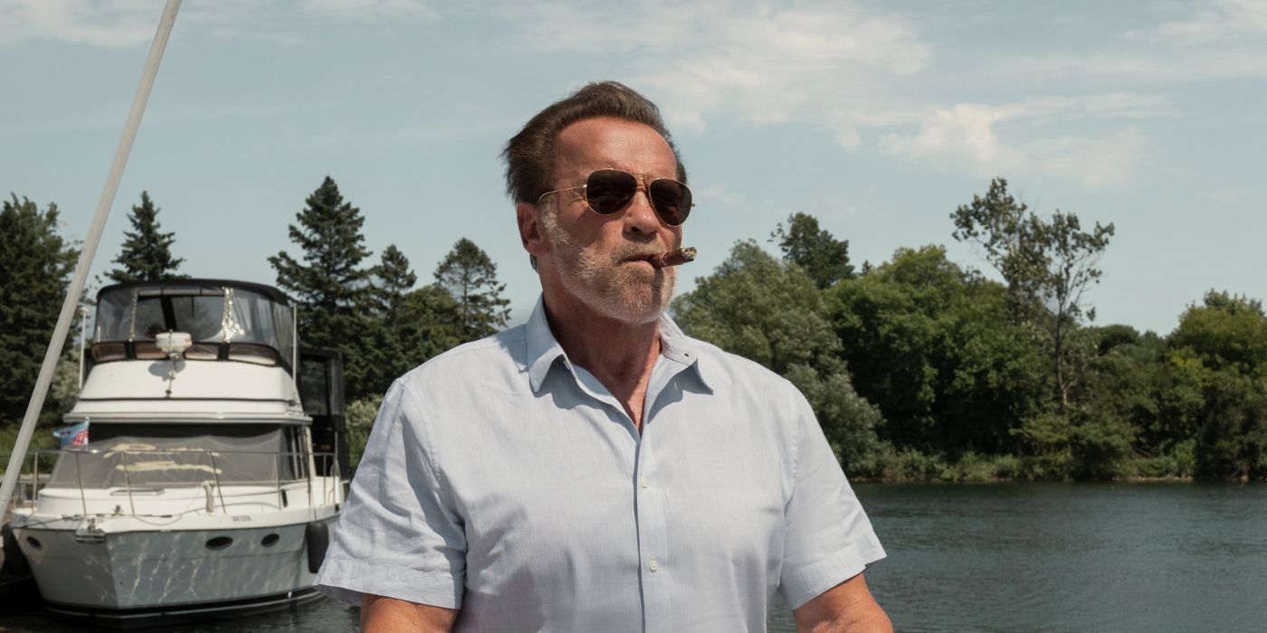 Arnold Schwarzengger as Luke Brunner, smoking a cigar on a yacht in FUBAR