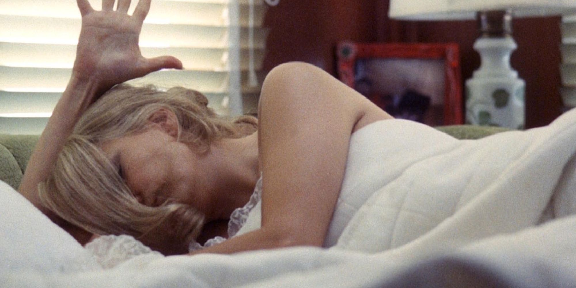 Gena Rowlands lying in bed in A Woman Under the Influence