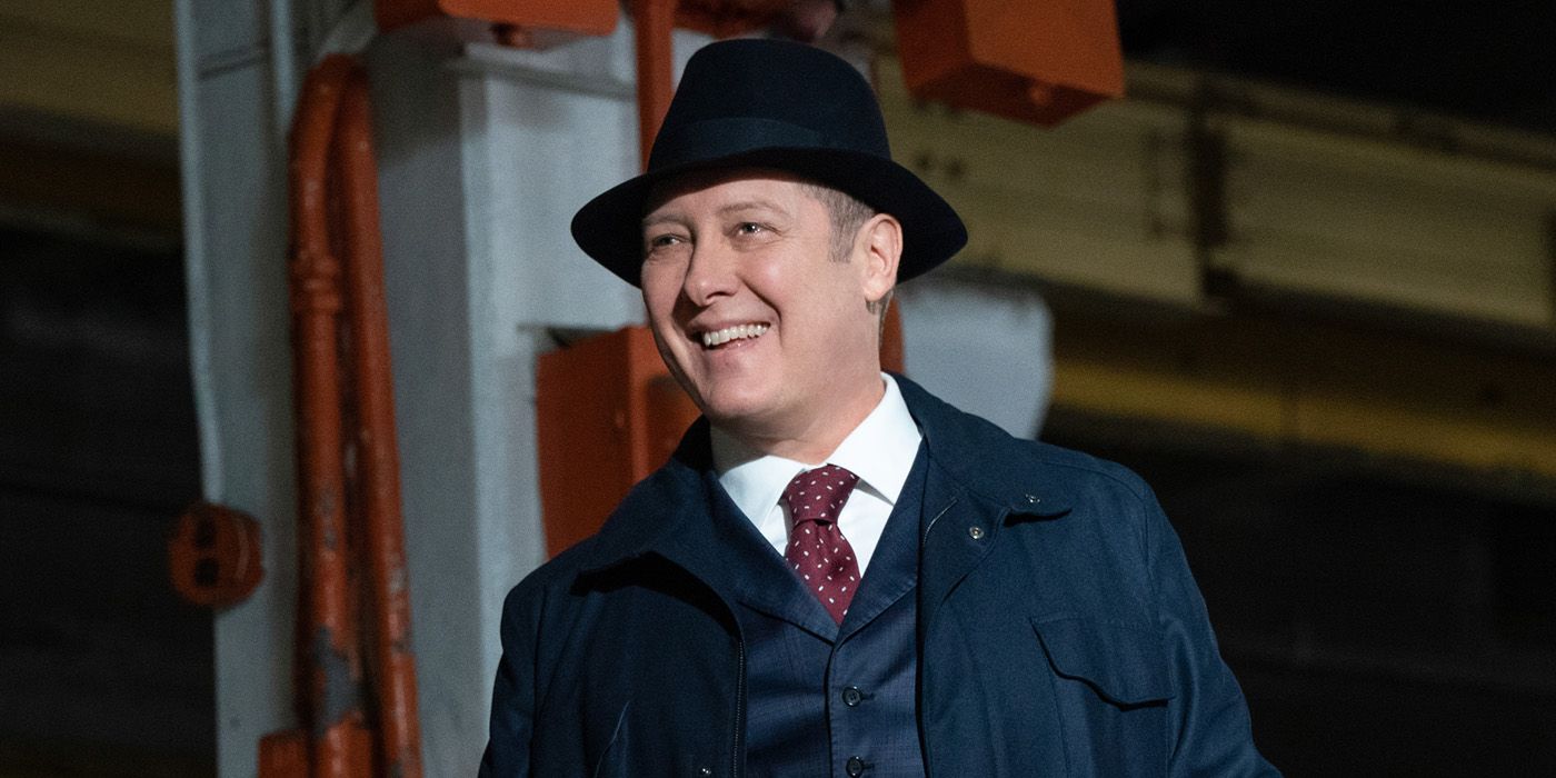 James Spader as Raymond Reddington in The Blacklist, smiling and wearing his signature hat.