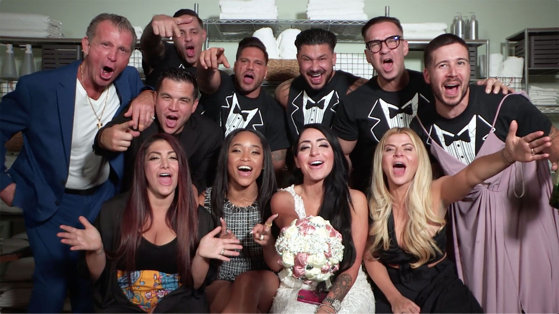 The Jersey Shore Family Vacation cast poses for a wedding photo 