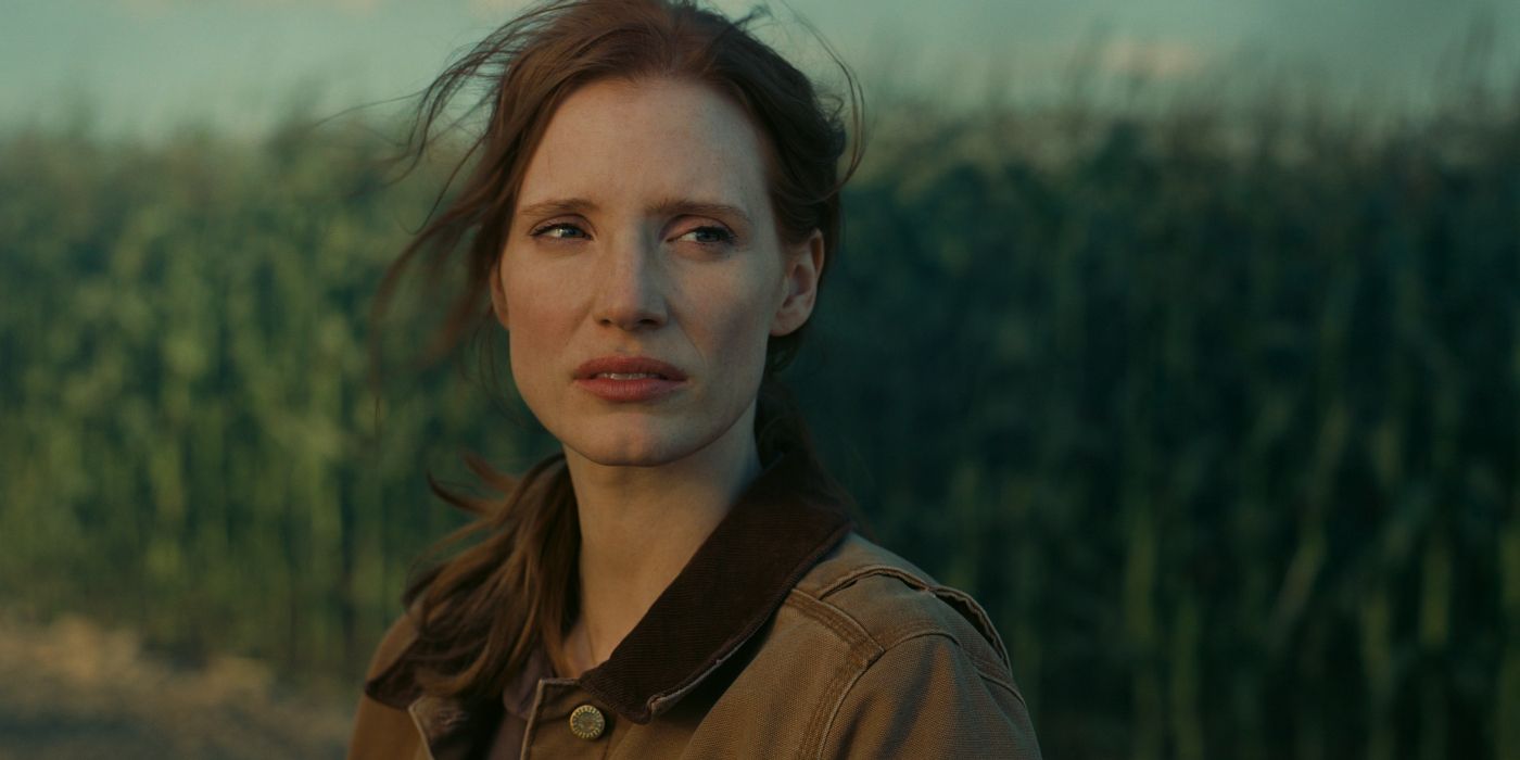 Jessica Chastain as Murph in Interstellar stands in corn field. 