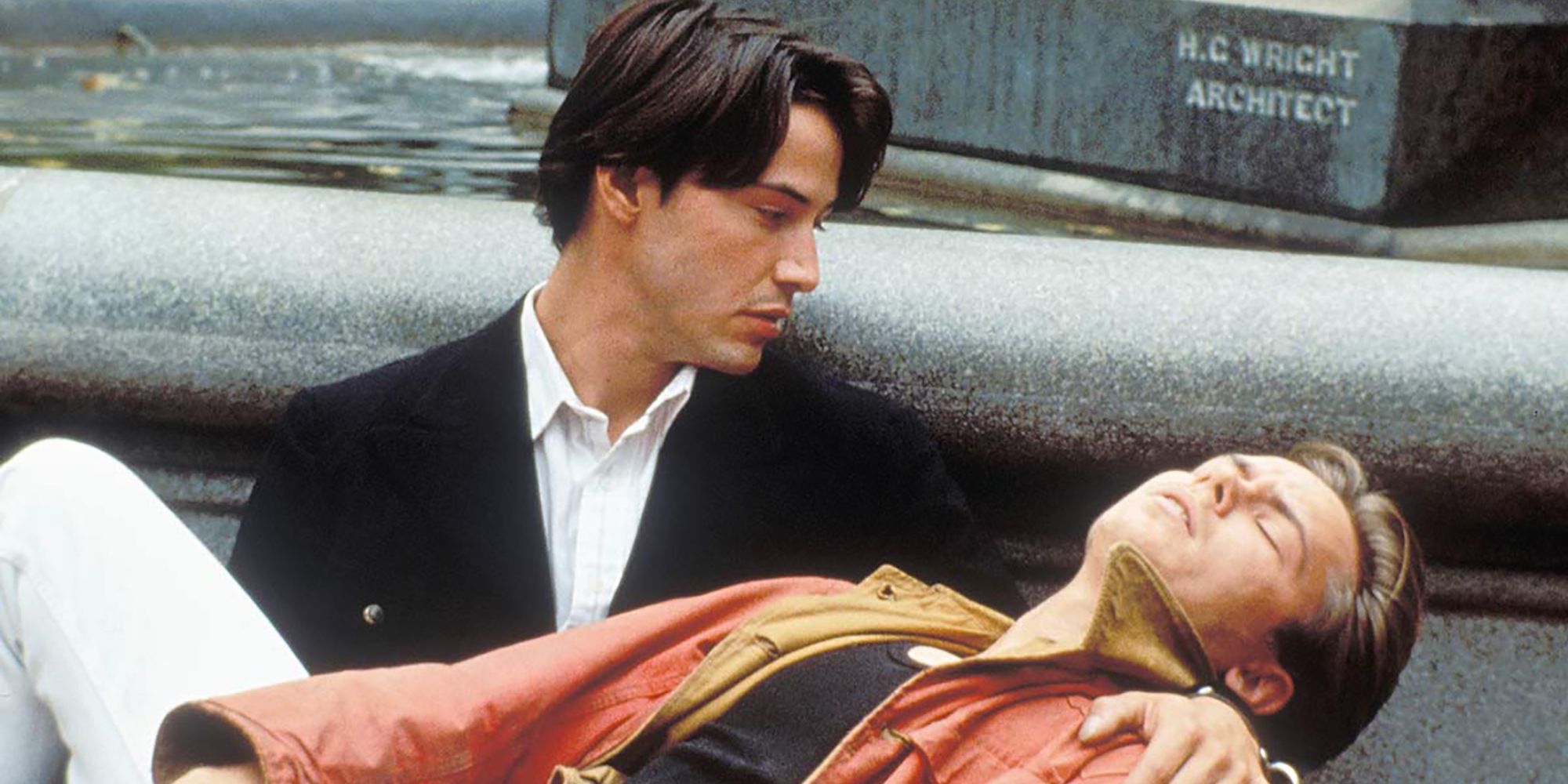 Keanu Reeves as Scott holding River Phoenix as Mikey in My Own Private Idaho