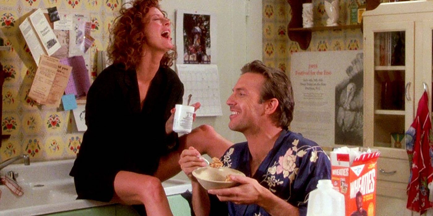 Kevin Costner and Susan Sarandon as Annie Savoy and "Crash" Davies laughing in the kitchen in Bull Durham