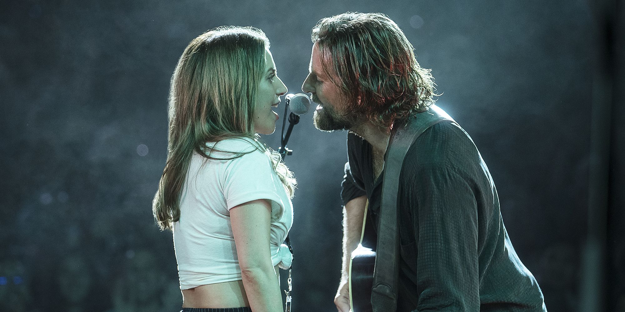 Lady Gaga and Bradley Cooper as Ally and Jackson Maine singing together in A Star is Born