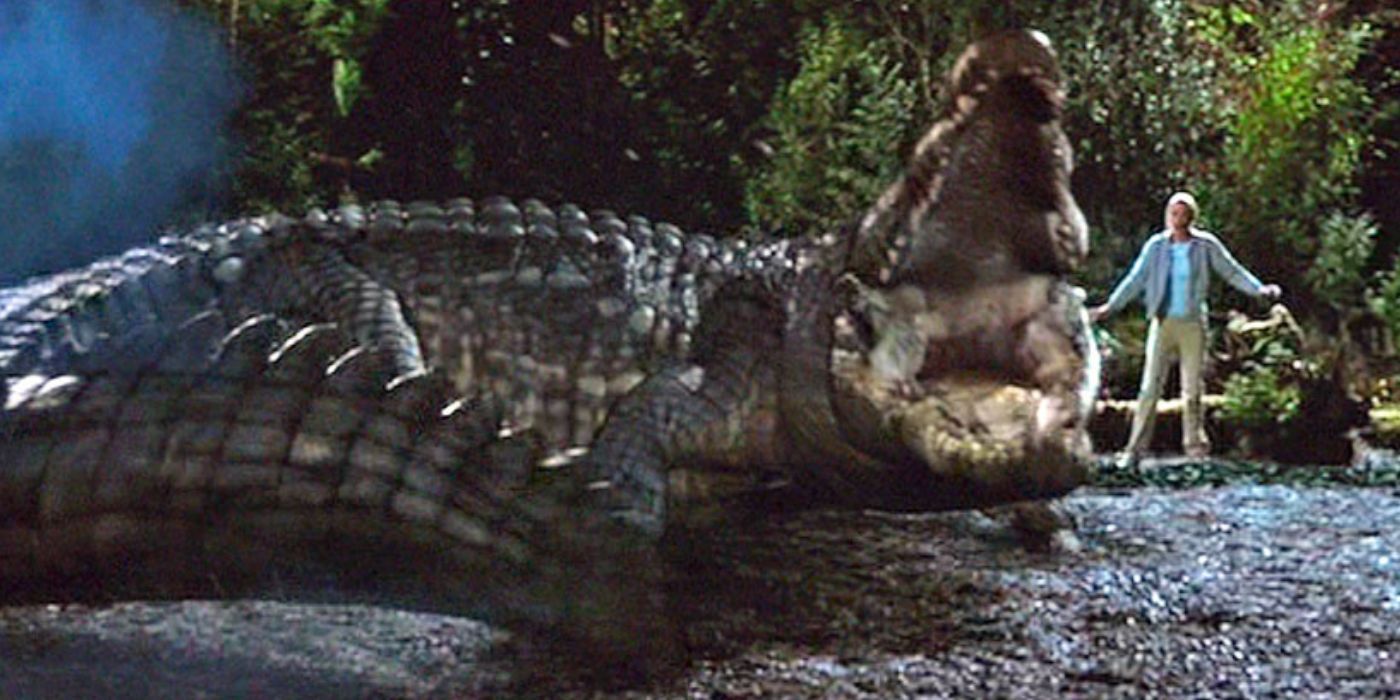 A large alligator opening its jaws in Lake Placid