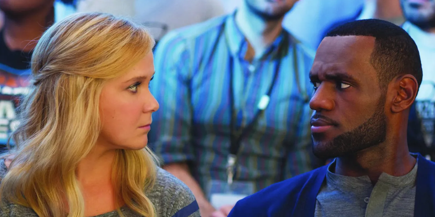 Amy Schumer and Lebron James in Trainwreck (2015)