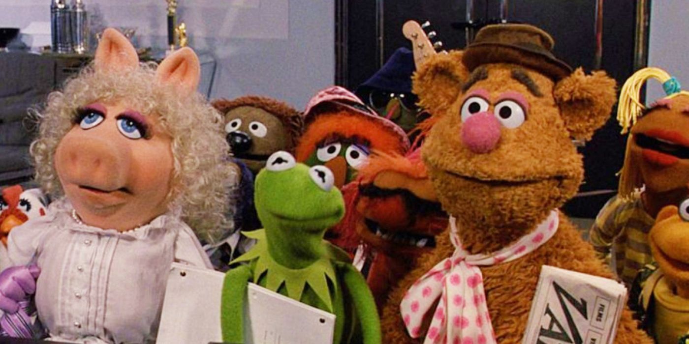 Miss Piggy, Kermit, and Fozzie, along with the other Muppets in Manhattan for the first time in The Muppets Take Manhattan